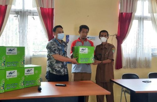 WOM Finance Santuni Janda dan Dhuafa